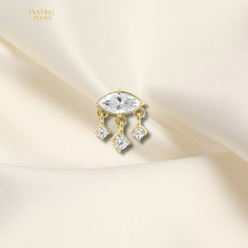 Zilverkleurige threadless top van nikkelvrij staal met marquise zirconia en drie kleine hangende steentjes. Luxe en elegant design.